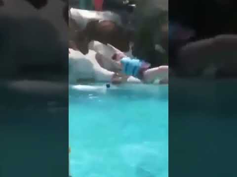 Fail: Girl falls in water by trying to get over it. #shorts #fail